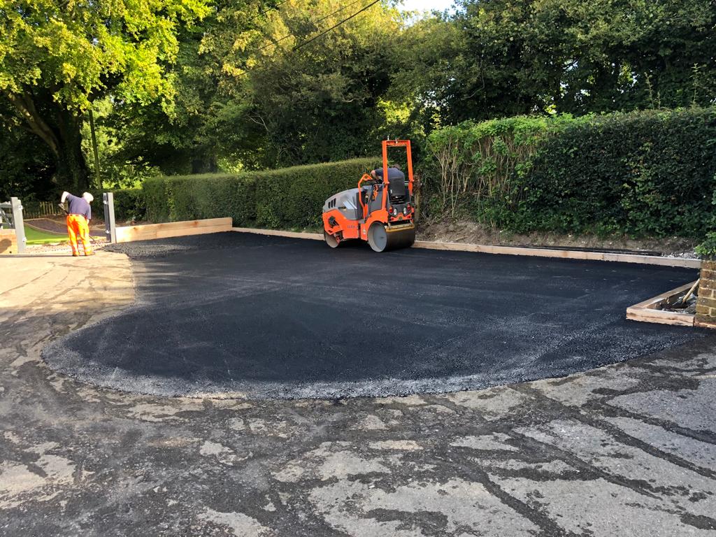This is a photo of a bitumen driveway which is in the process of being installed by Lowood Asphalt & Bitumen Surfacing