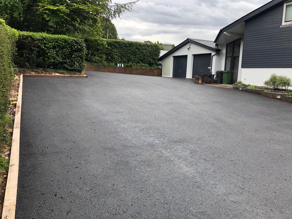This is a photo of a asphalt driveway which is in the process of being installed by Lowood Asphalt & Bitumen Surfacing
